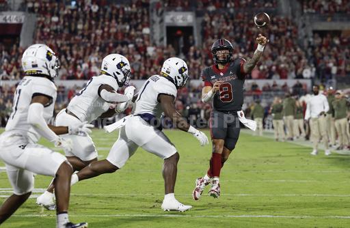 Dillon Gabriel's schoolrecord 8 TDs lead Oklahoma past West Virginia